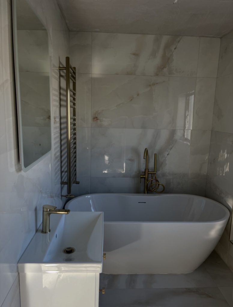 Freestanding Bath With Brushed Brass Fittings